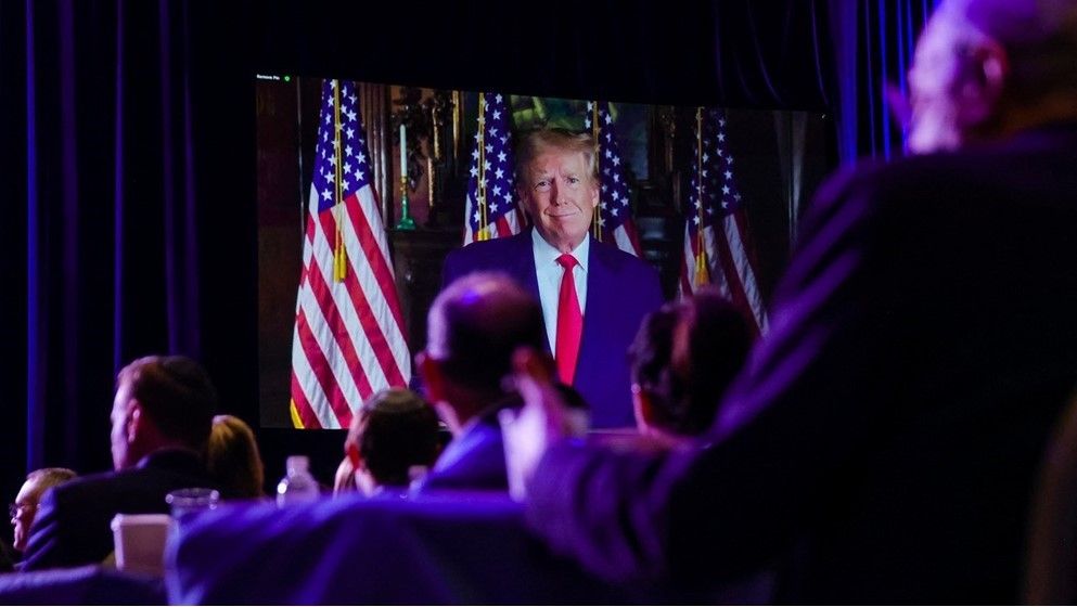 Trump gets warm reception at Republican gathering as rivals la...