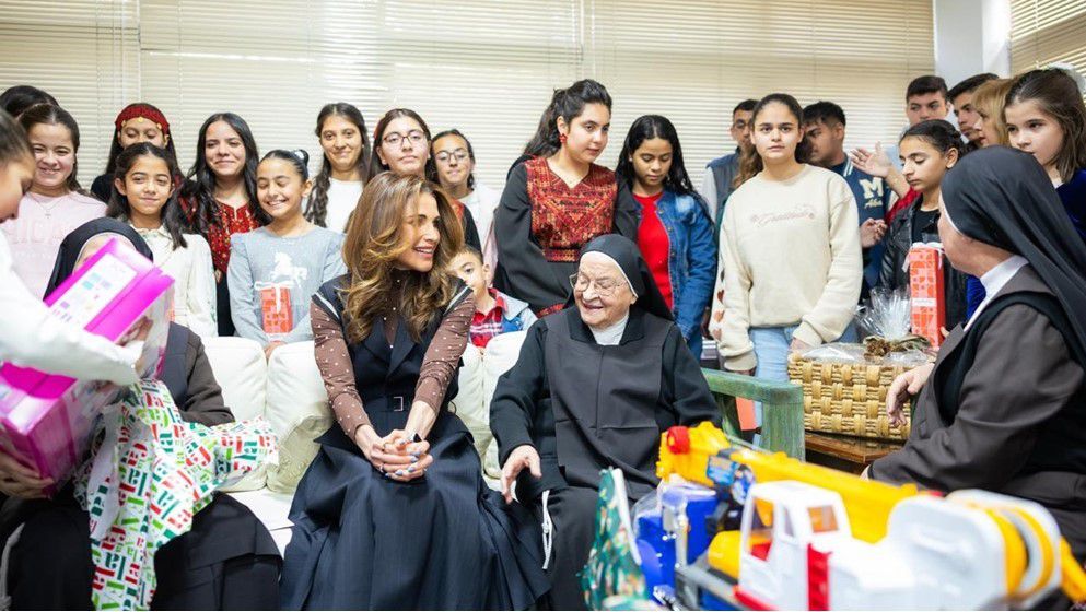 The Queen joins the children of the Mar Mansour Charitable Society in their Christmas celebration